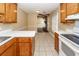 Kitchen with view into living room and fireplace at 208 Buckskin Dr, Summerville, SC 29486