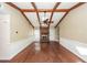 Living room with hardwood floors, exposed beams, and a fireplace at 208 Buckskin Dr, Summerville, SC 29486
