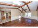 Bright living room with hardwood floors, exposed beams, and skylights at 208 Buckskin Dr, Summerville, SC 29486