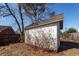 White storage shed in backyard, offering extra storage space at 208 Buckskin Dr, Summerville, SC 29486