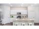 White kitchen with granite countertops and stainless steel appliances at 223 Pine Crest View Dr, Summerville, SC 29486