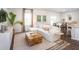 Bright living room features an open floor plan, comfortable sectional sofa, and large windows at 223 Pine Crest View Dr, Summerville, SC 29486