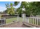 Deck with a view of a fenced backyard, shed, and trees at 2236 Bailey Dr, North Charleston, SC 29405