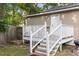 White wooden stairs leading up to a deck beside a shed at 2236 Bailey Dr, North Charleston, SC 29405