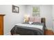 Cozy bedroom with a double bed, soft bedding, and a window with blinds at 2236 Bailey Dr, North Charleston, SC 29405