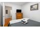 Bedroom with a dresser and a view of the bathroom at 2236 Bailey Dr, North Charleston, SC 29405