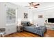 Bright bedroom with a comfortable bed and hardwood floors at 2236 Bailey Dr, North Charleston, SC 29405