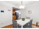 Casual dining area with kitchen view, white table and gray chairs at 2236 Bailey Dr, North Charleston, SC 29405