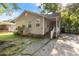 House exterior with a front porch and landscaped yard at 2236 Bailey Dr, North Charleston, SC 29405