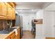 Updated kitchen with wood cabinets, tile backsplash, and stainless steel fridge at 2236 Bailey Dr, North Charleston, SC 29405
