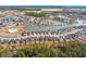 Aerial view of houses surrounding a lake at 230 Granton Edge Ln, Summerville, SC 29486