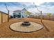 Backyard with fire pit and string lights at 230 Granton Edge Ln, Summerville, SC 29486
