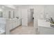 Double vanity bathroom with a view into another bedroom at 230 Granton Edge Ln, Summerville, SC 29486