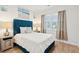 Bedroom with teal headboard and wood flooring at 230 Granton Edge Ln, Summerville, SC 29486