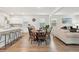 A charming dining area with a round table and black chairs at 230 Granton Edge Ln, Summerville, SC 29486
