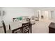 Charming dining area with seating for four, adjacent to a living area at 230 Granton Edge Ln, Summerville, SC 29486