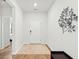 Light and airy entryway with wood floors and bench at 230 Granton Edge Ln, Summerville, SC 29486