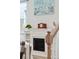 White fireplace with built-in shelving and mantel at 230 Granton Edge Ln, Summerville, SC 29486