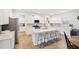 Modern kitchen with white cabinets, stainless steel appliances, and quartz countertops at 230 Granton Edge Ln, Summerville, SC 29486