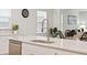 Modern kitchen with a farmhouse sink and stainless steel appliances at 230 Granton Edge Ln, Summerville, SC 29486