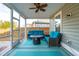 Relaxing screened porch with seating and ceiling fan at 230 Granton Edge Ln, Summerville, SC 29486