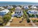Aerial view of beach neighborhood, showcasing a gray house in the center at 3019 Brownell Ave, Sullivans Island, SC 29482