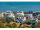Aerial view of coastal neighborhood featuring charming houses near the ocean at 3019 Brownell Ave, Sullivans Island, SC 29482