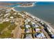 Aerial view showing beachfront homes and community with ocean access at 3019 Brownell Ave, Sullivans Island, SC 29482