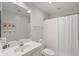 Small bathroom with shower, toilet and vanity at 3019 Brownell Ave, Sullivans Island, SC 29482