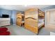 Bedroom with two sets of wooden bunk beds at 3019 Brownell Ave, Sullivans Island, SC 29482