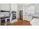 Updated kitchen featuring stainless steel appliances and white cabinets at 3019 Brownell Ave, Sullivans Island, SC 29482