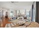 Open living area with hardwood floors, comfortable seating, and views of the kitchen at 3019 Brownell Ave, Sullivans Island, SC 29482