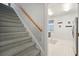 Carpeted stairs leading to laundry and a basement at 3019 Brownell Ave, Sullivans Island, SC 29482