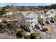 Elevated view of the house, showing landscaping and driveway at 3038 Fraserburgh Way # 2200, Mount Pleasant, SC 29466