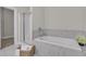 Relaxing bathroom with soaking tub and marble tile at 3038 Fraserburgh Way # 2200, Mount Pleasant, SC 29466