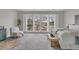 Bright bedroom featuring a cozy sitting area and golf course views at 3038 Fraserburgh Way # 2200, Mount Pleasant, SC 29466