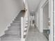Bright entryway with gray carpet stairs and tile flooring at 3038 Fraserburgh Way # 2200, Mount Pleasant, SC 29466