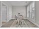 Home office with white desk, wood flooring, and plantation shutters at 3038 Fraserburgh Way # 2200, Mount Pleasant, SC 29466