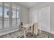 Home office with white desk, wood flooring, and plantation shutters at 3038 Fraserburgh Way # 2200, Mount Pleasant, SC 29466