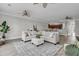 Spacious living room with sectional sofa, ottoman, and area rug at 3038 Fraserburgh Way # 2200, Mount Pleasant, SC 29466