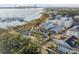 Aerial view of waterfront community with marina, park, and charming homes at 310 Longshore St # 645, Daniel Island, SC 29492