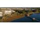 Aerial view of waterfront community with pier and boardwalk at 310 Longshore St # 645, Daniel Island, SC 29492