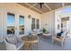 Relaxing balcony with wicker furniture and view of the neighborhood at 310 Longshore St # 645, Daniel Island, SC 29492