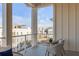 Private balcony with wicker chairs and neighborhood views at 310 Longshore St # 645, Daniel Island, SC 29492