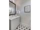 Modern bathroom with gray vanity and patterned floor tiles at 310 Longshore St # 645, Daniel Island, SC 29492