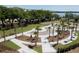 Expansive community park with palm trees and walkways at 310 Longshore St # 645, Daniel Island, SC 29492