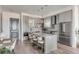 Modern kitchen with gray cabinets and white countertops at 310 Longshore St # 645, Daniel Island, SC 29492