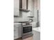 Modern kitchen features stainless steel appliances and gray cabinetry at 310 Longshore St # 645, Daniel Island, SC 29492