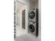 Convenient laundry room with stackable washer and dryer at 310 Longshore St # 645, Daniel Island, SC 29492