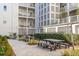 Private patio with multiple tables and chairs at 310 Longshore St # 645, Daniel Island, SC 29492